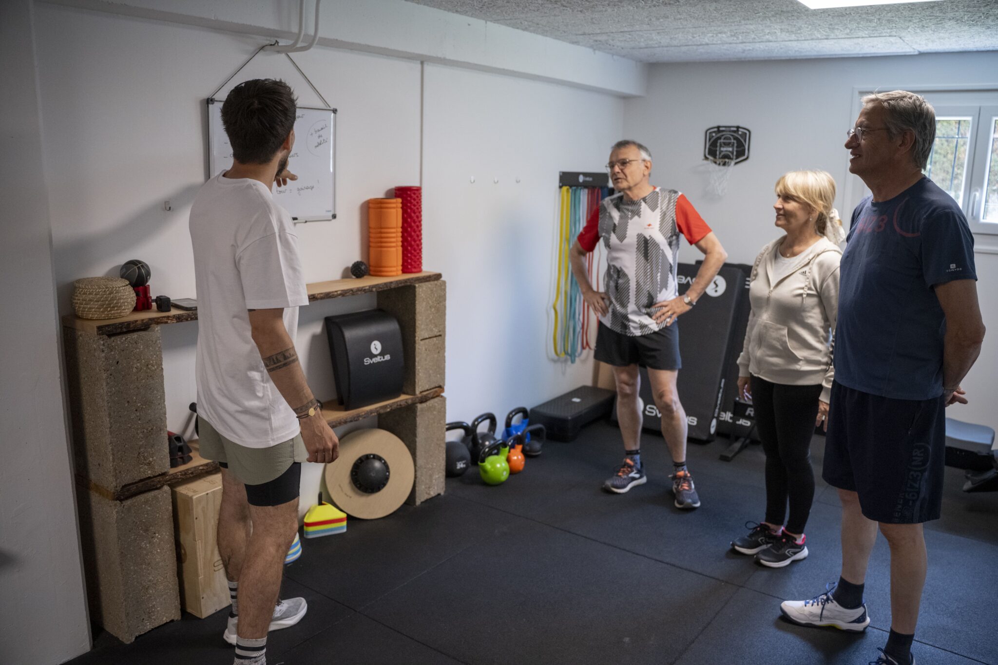 Exercice en suspension avec coach